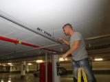 Roman is adjusting the trunking.jpg